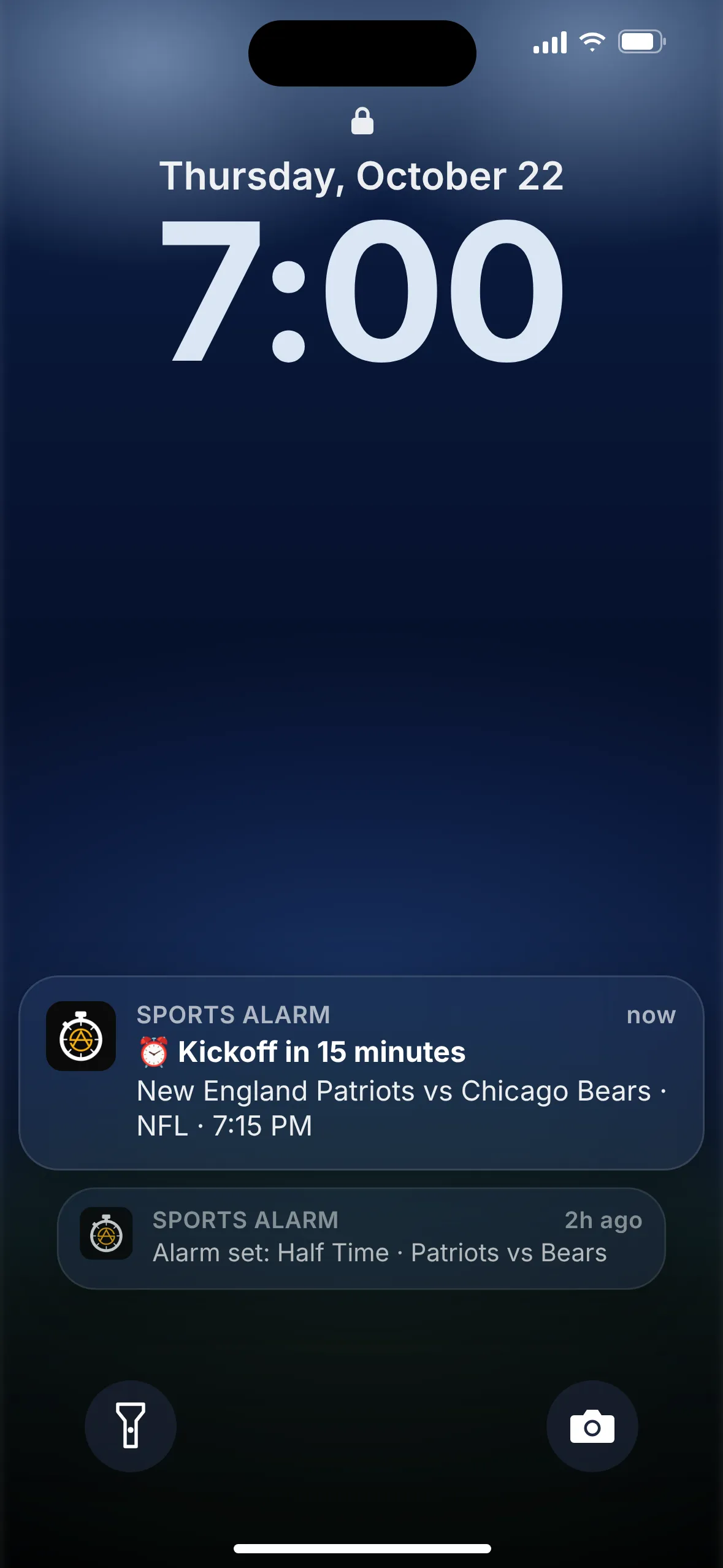 A phone lock screen showing a Sports Alarm notification